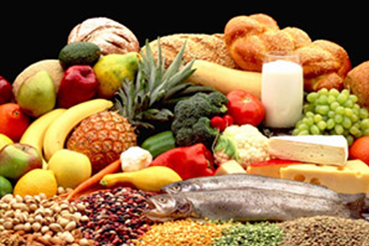 A table filled with lots of different fruits and vegetables.